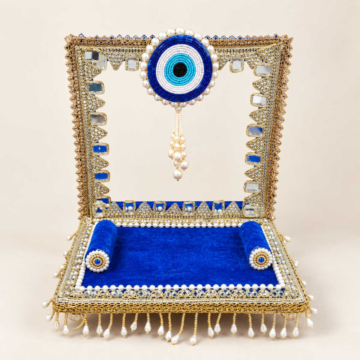 Royal blue evil eye singhasan empty view showing velvet seat and mirror embellishments