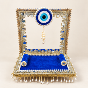 Royal blue evil eye singhasan empty view showing velvet seat and mirror embellishments